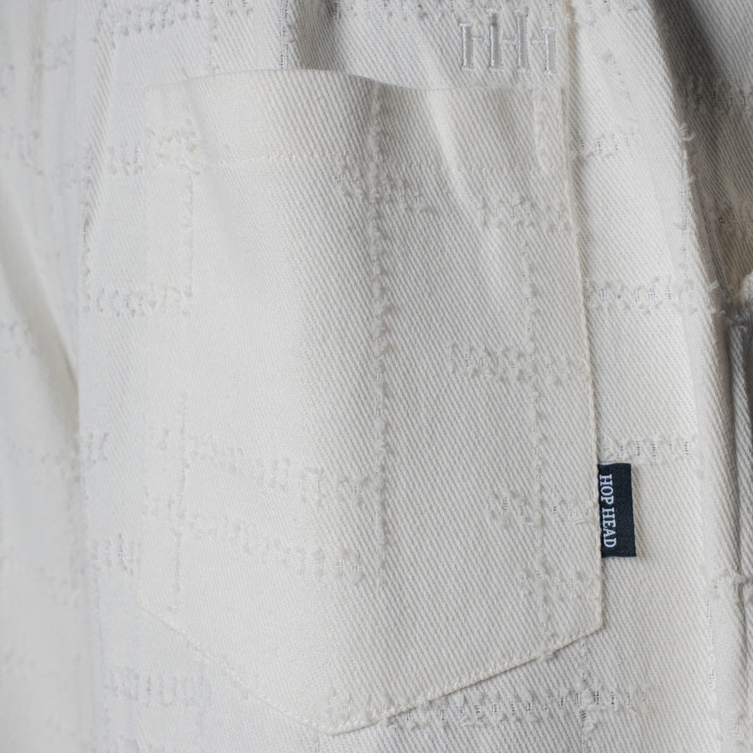 WHITE ROOFING BOOT CUT DENIM