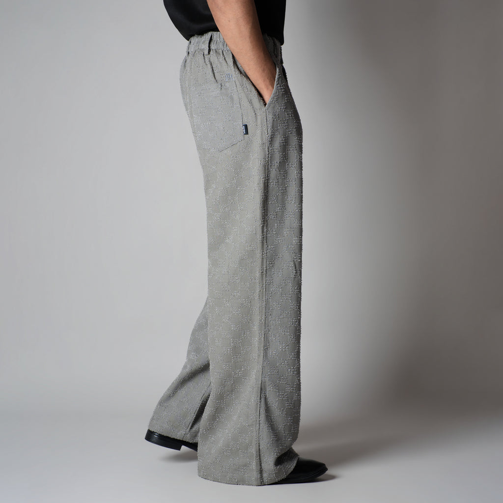 GREY CHECKERED ROOFING BOOT CUT DENIM
