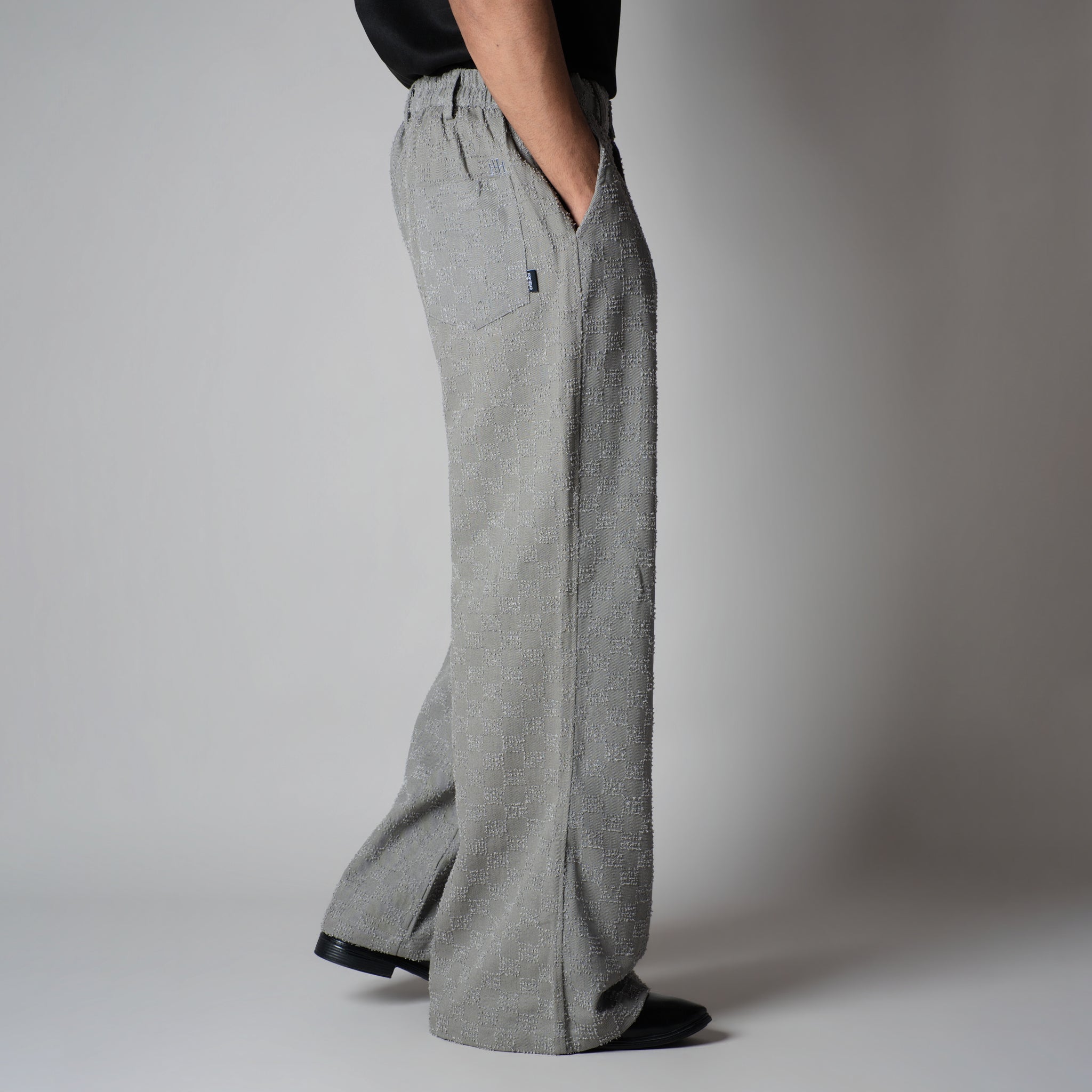 GREY CHECKERED ROOFING BOOT CUT DENIM