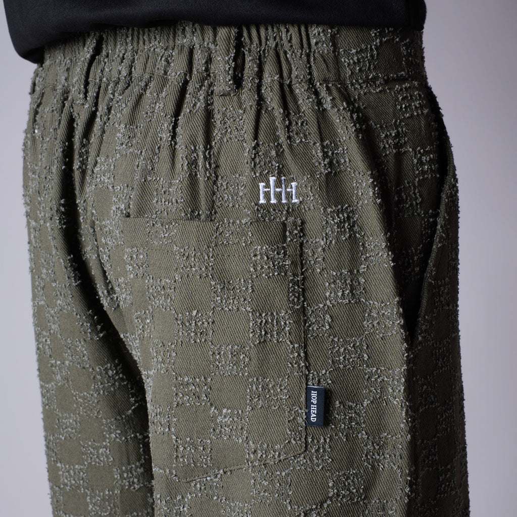 OLIVE CHECKERED ROOFING BOOT CUT DENIM