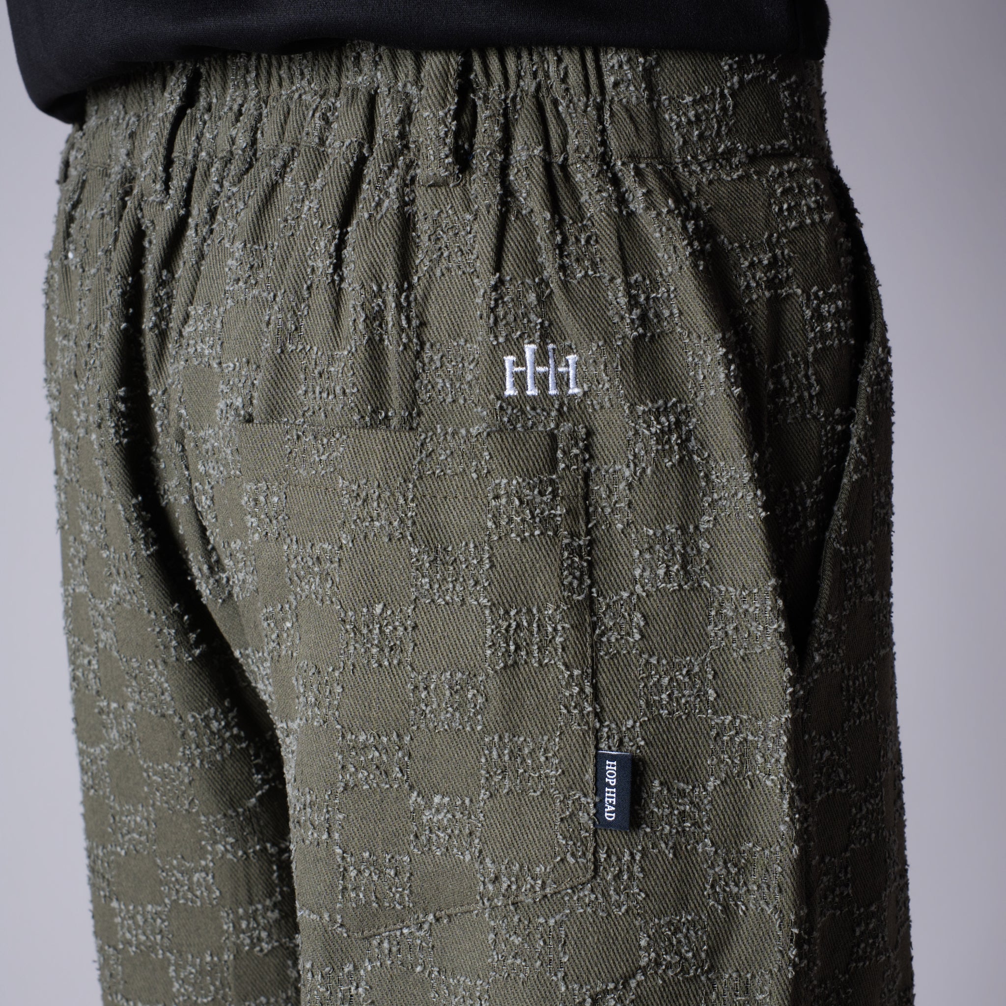 OLIVE CHECKERED ROOFING BOOT CUT DENIM