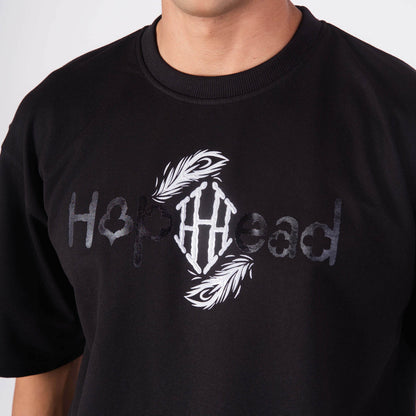 LEUCISTIC PEACOCK OVERSIZED GRAPHIC T-SHIRT