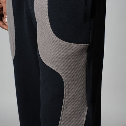 NAVY  FRONT PATCH PATCHWORK SWEATPANTS